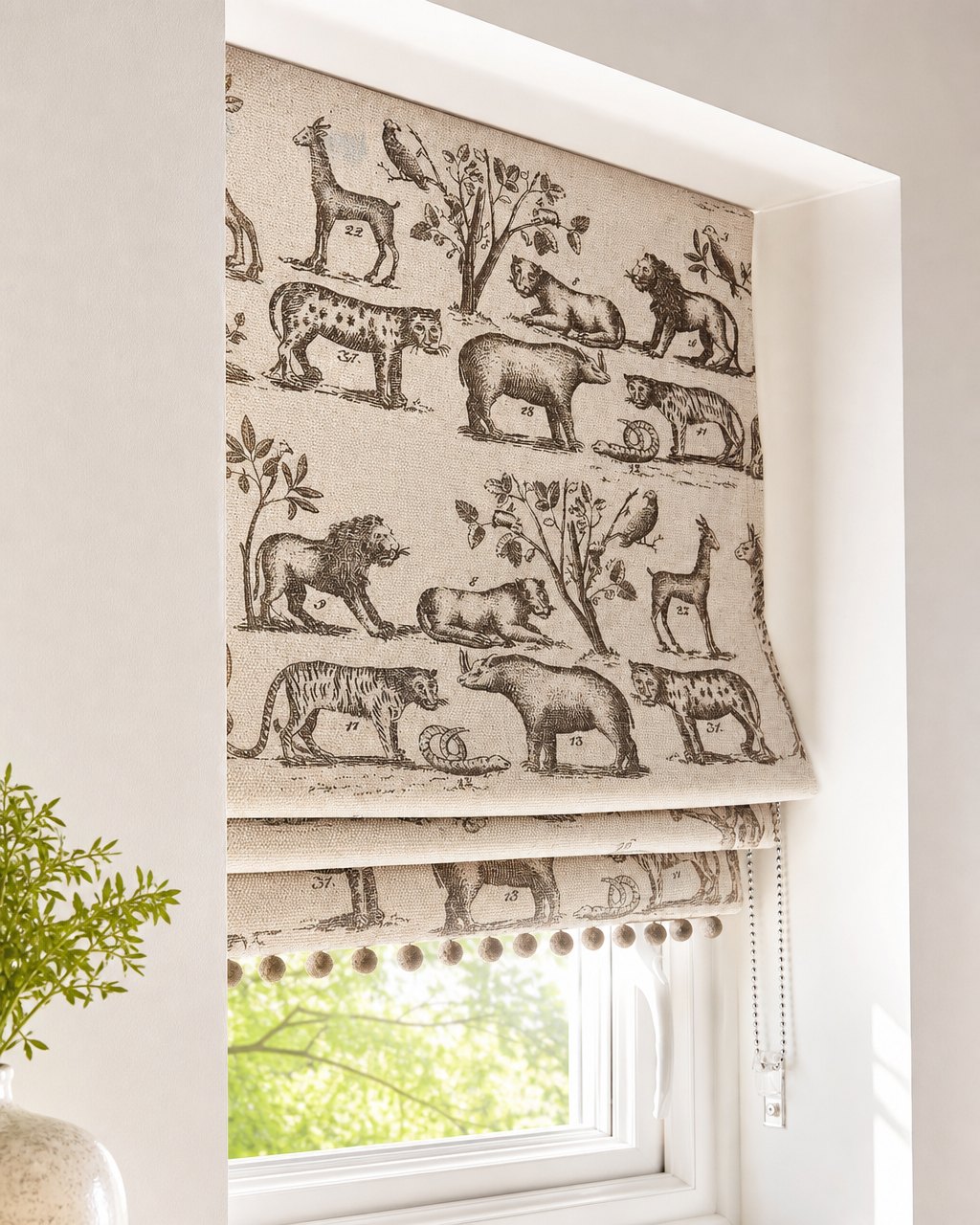 Patterned Roman blind with animal fabric