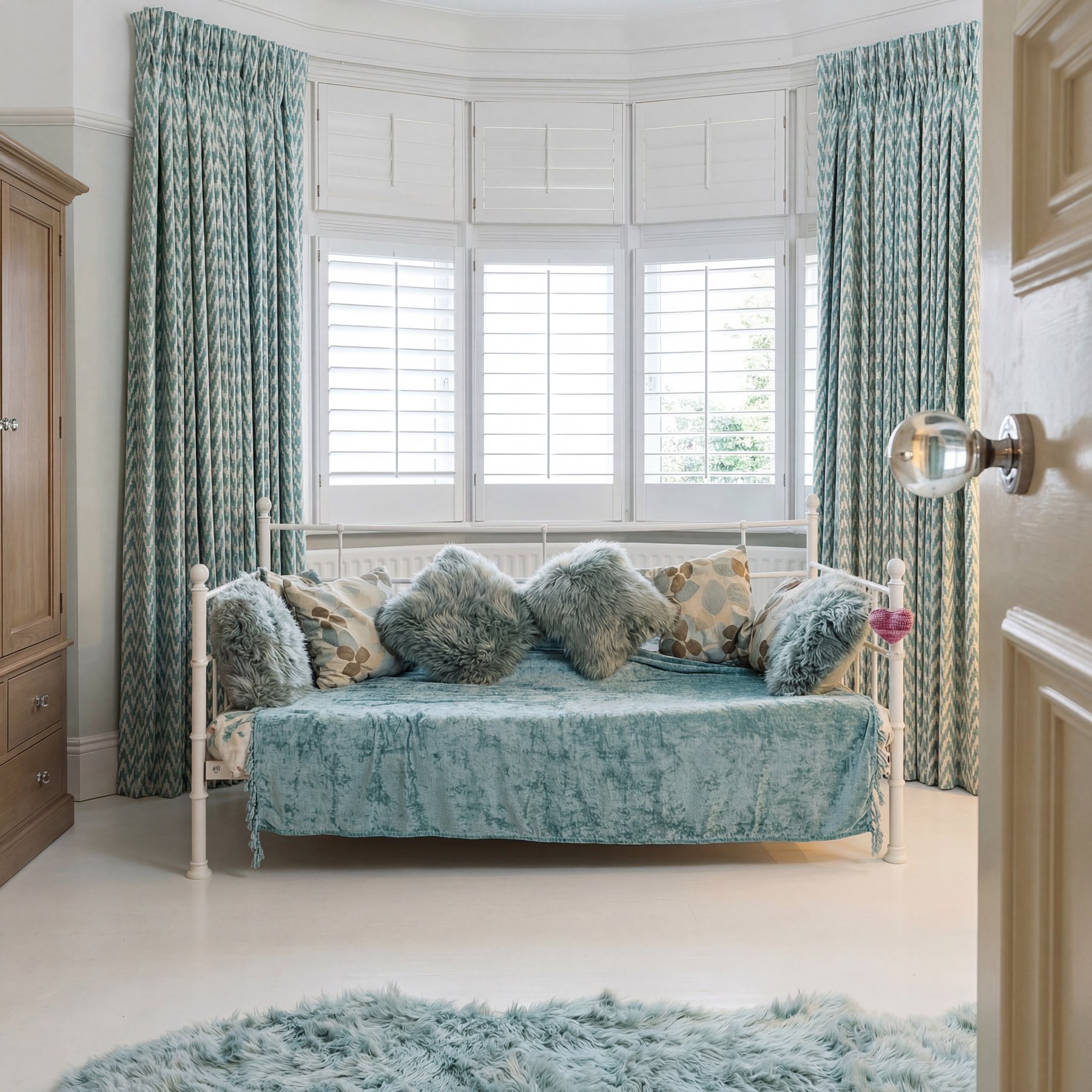 Curtains in a soft blue living room